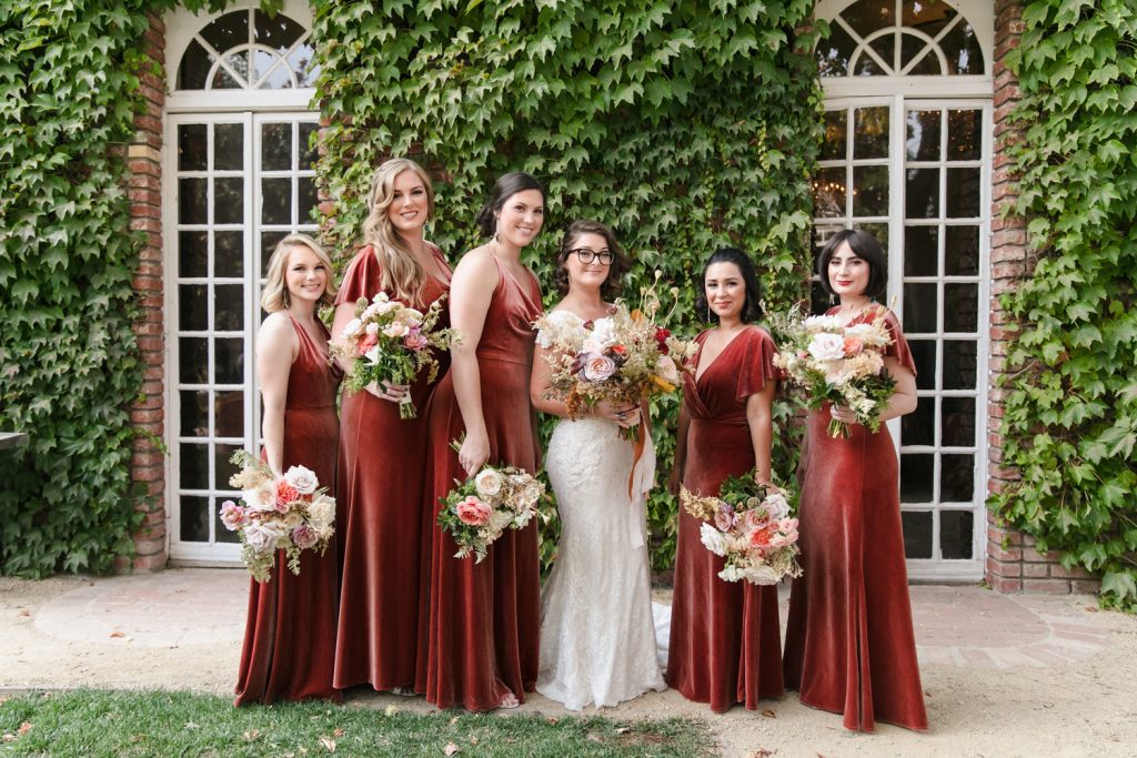 bride and bridesmaids getting together