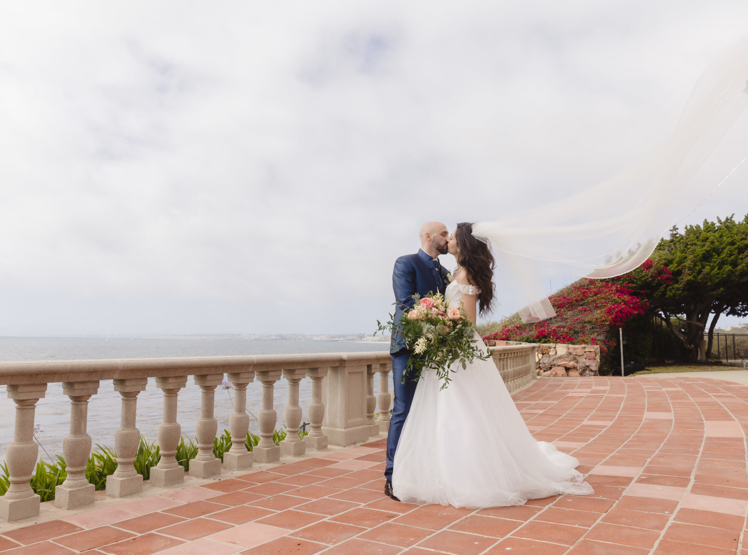 Bride and groom sharing a kiss during their Palos Verdes elopement shoot with Christopher Brown Weddings