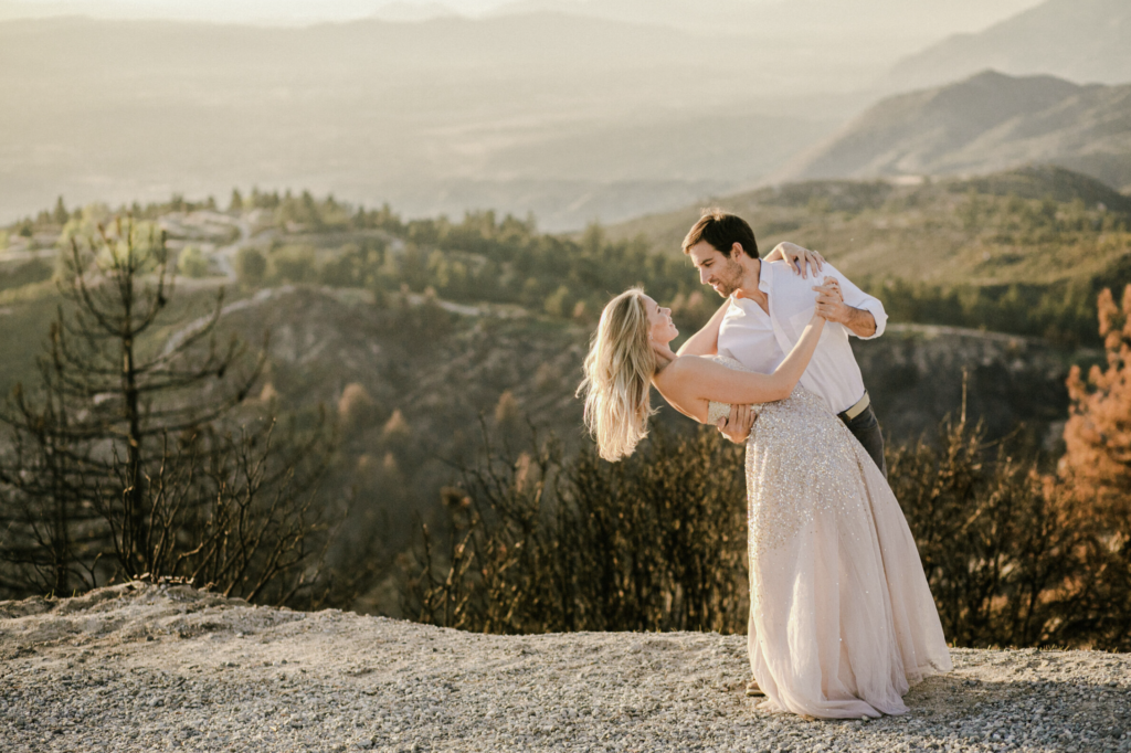 Couple sharing a dance during their golden hour engagement shoot with Christopher Brown Weddings