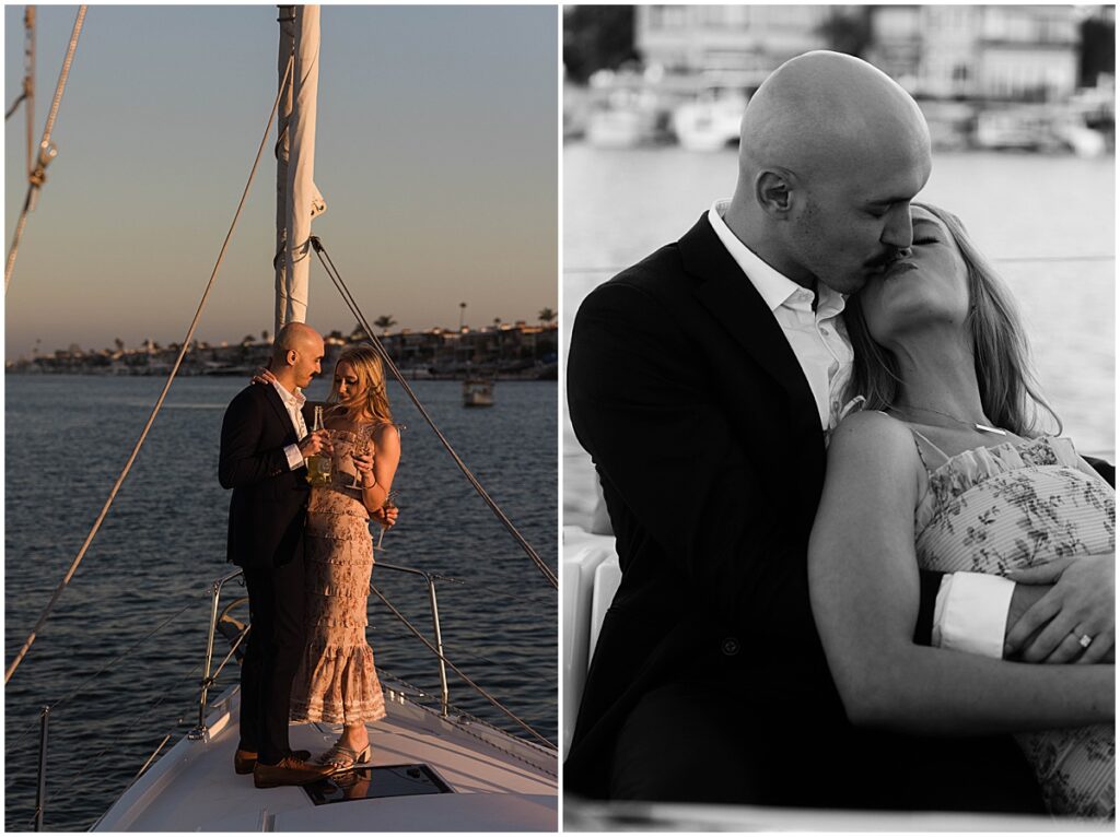 Couple kissing and clinking champagne glasses on a sailboat in Newport Beach harbor