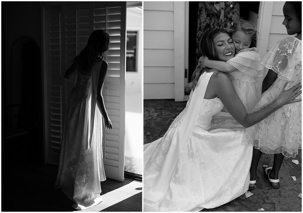 Bride peaking out blinds and hugging child