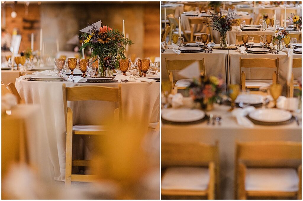 wedding reception tables with florals and amber goblets at rustic wedding reception at Central Idaho 4-H Camp