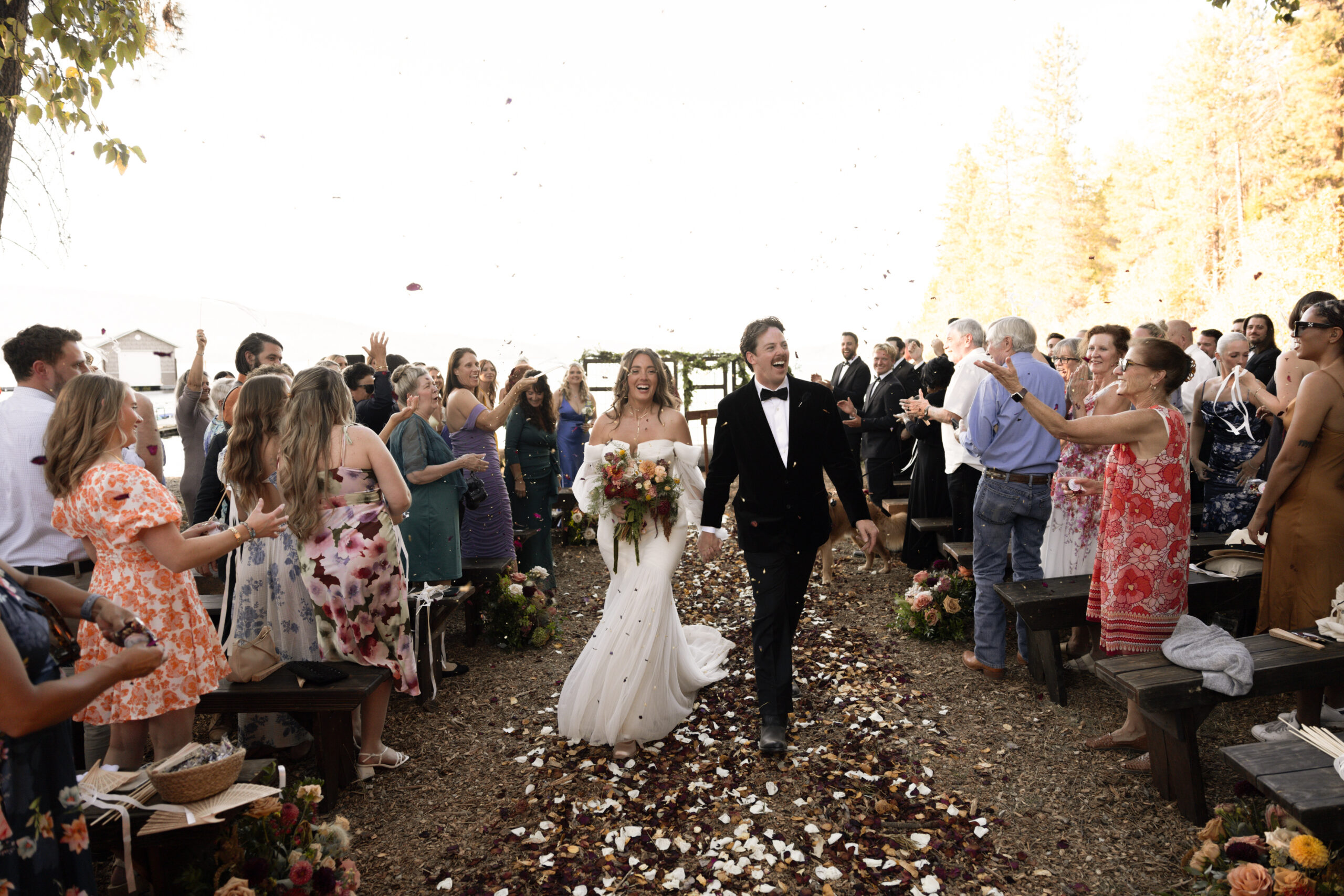 Bride and groom walking down the aisle after wedding ceremony Coeur d’Alene