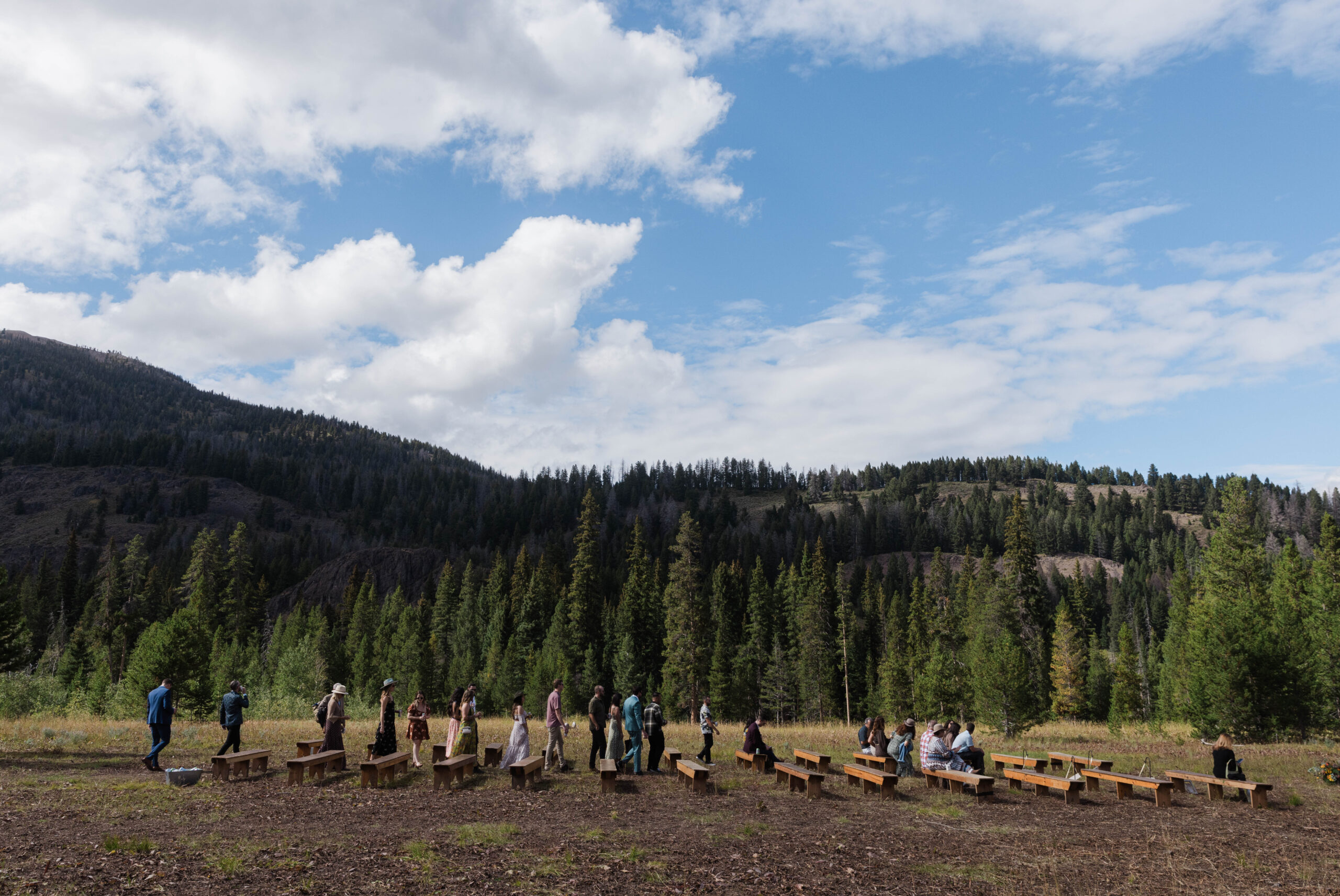 Guests leaving the wedding ceremony site at Central Idaho 4-H Camp