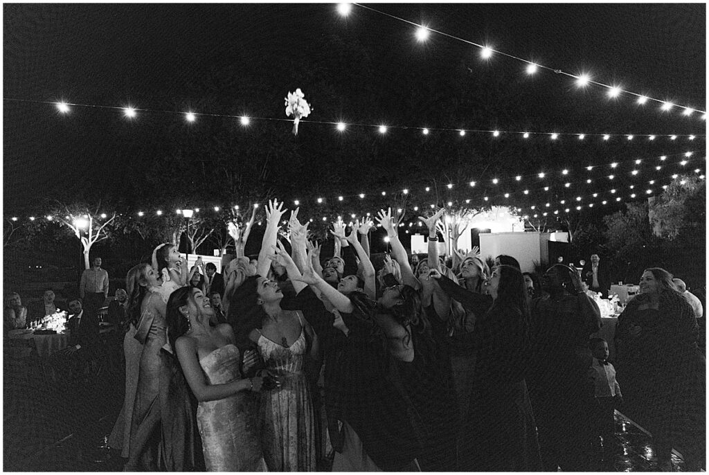 Bouquet toss at Muckenthaler Mansion wedding