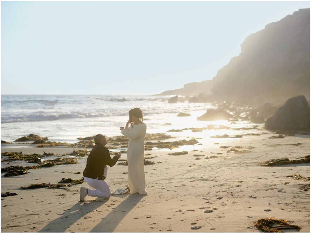 Man proposing to his girlfriend at Monarch Beach, California