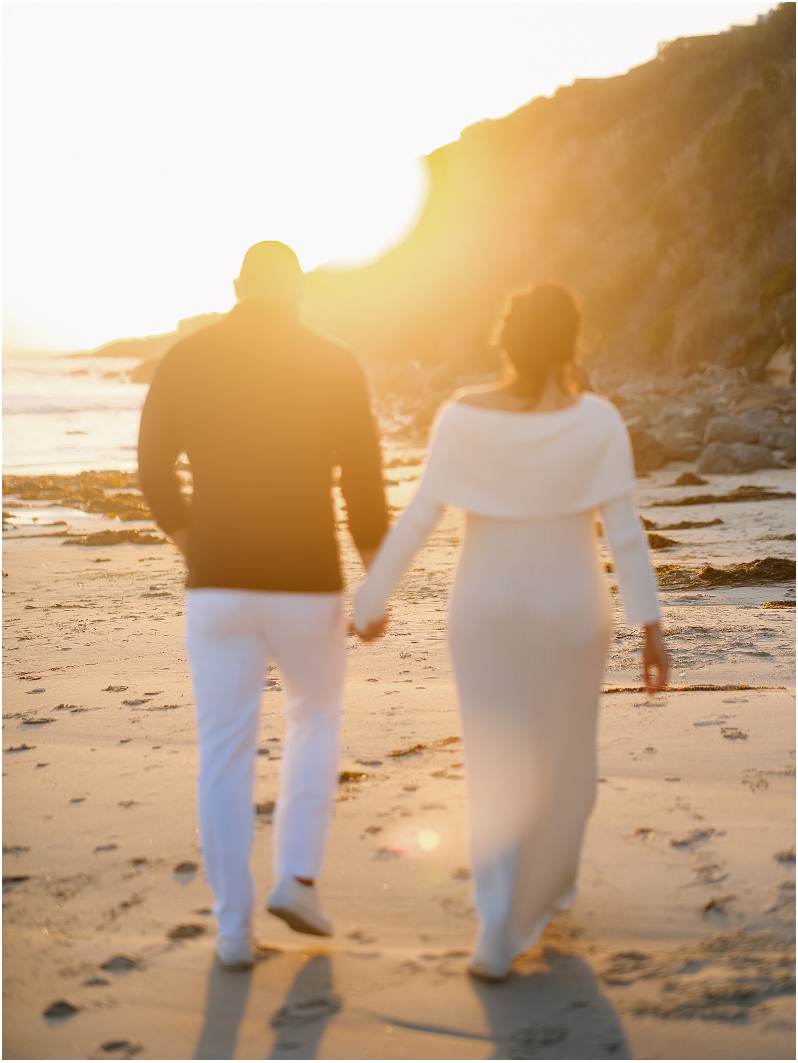A couple taking engagement photos at Monarch Beach California
