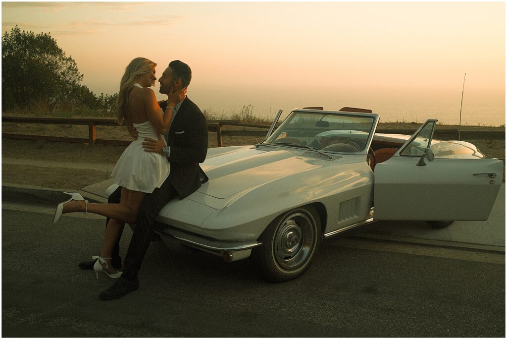 A couple taking their Laguna Beach engagement photos